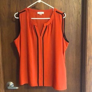 Tomato red sleeveless Calvin Klain satin top.